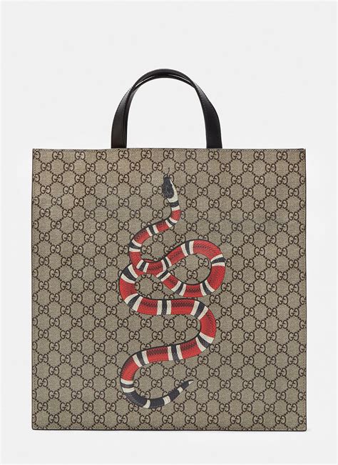 gucci bag with snake design.